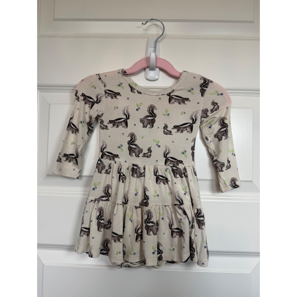 The Sleepy Sloth Skunk Blueberry Bamboo Tiered Skirt Bodysuit 12-18M Cream
